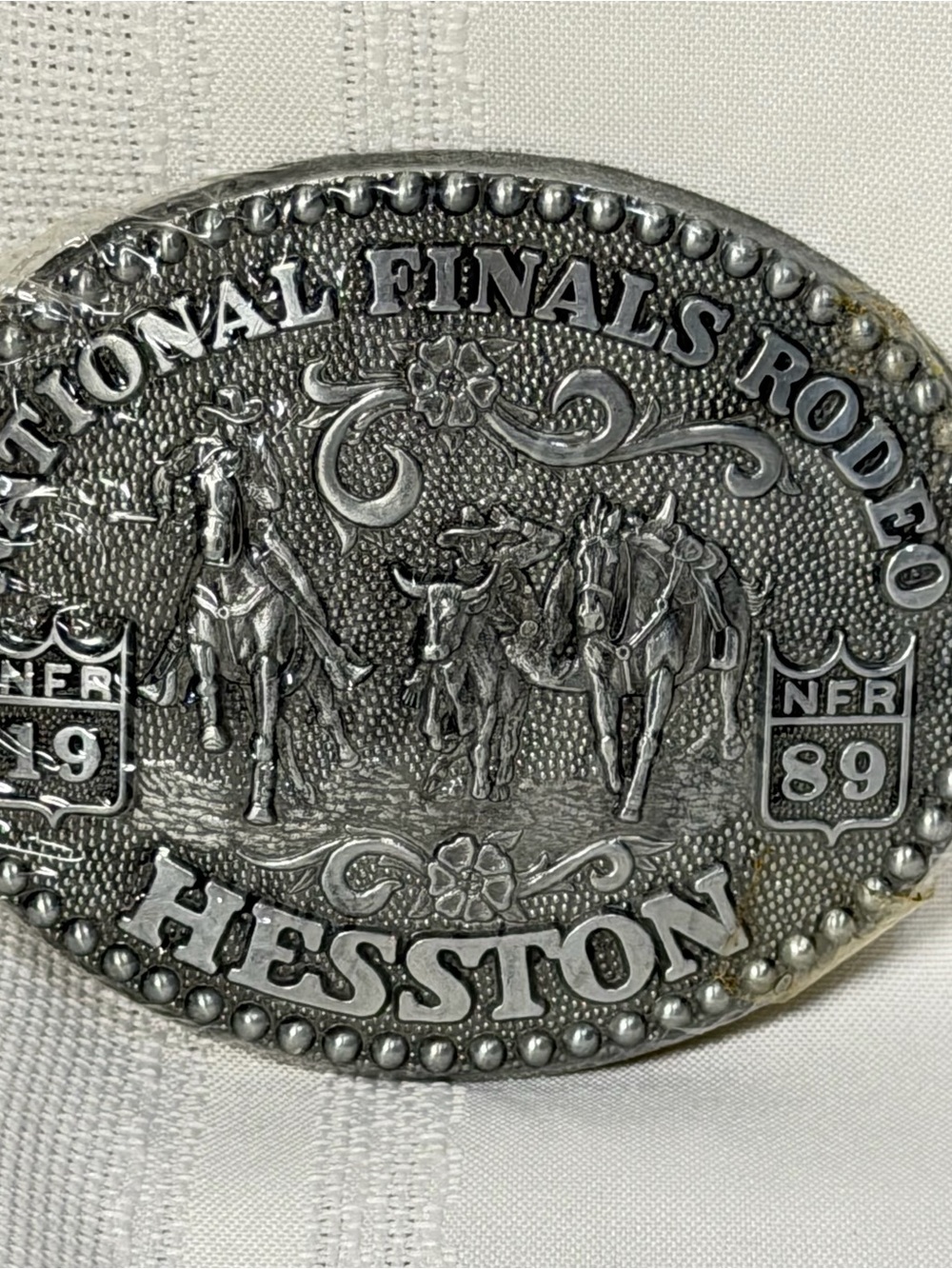 NEW 1989 HESSTON NATIONAL FINALS RODEO BELT BUCKLE SEALED COWBOYS FRED FELLOWS